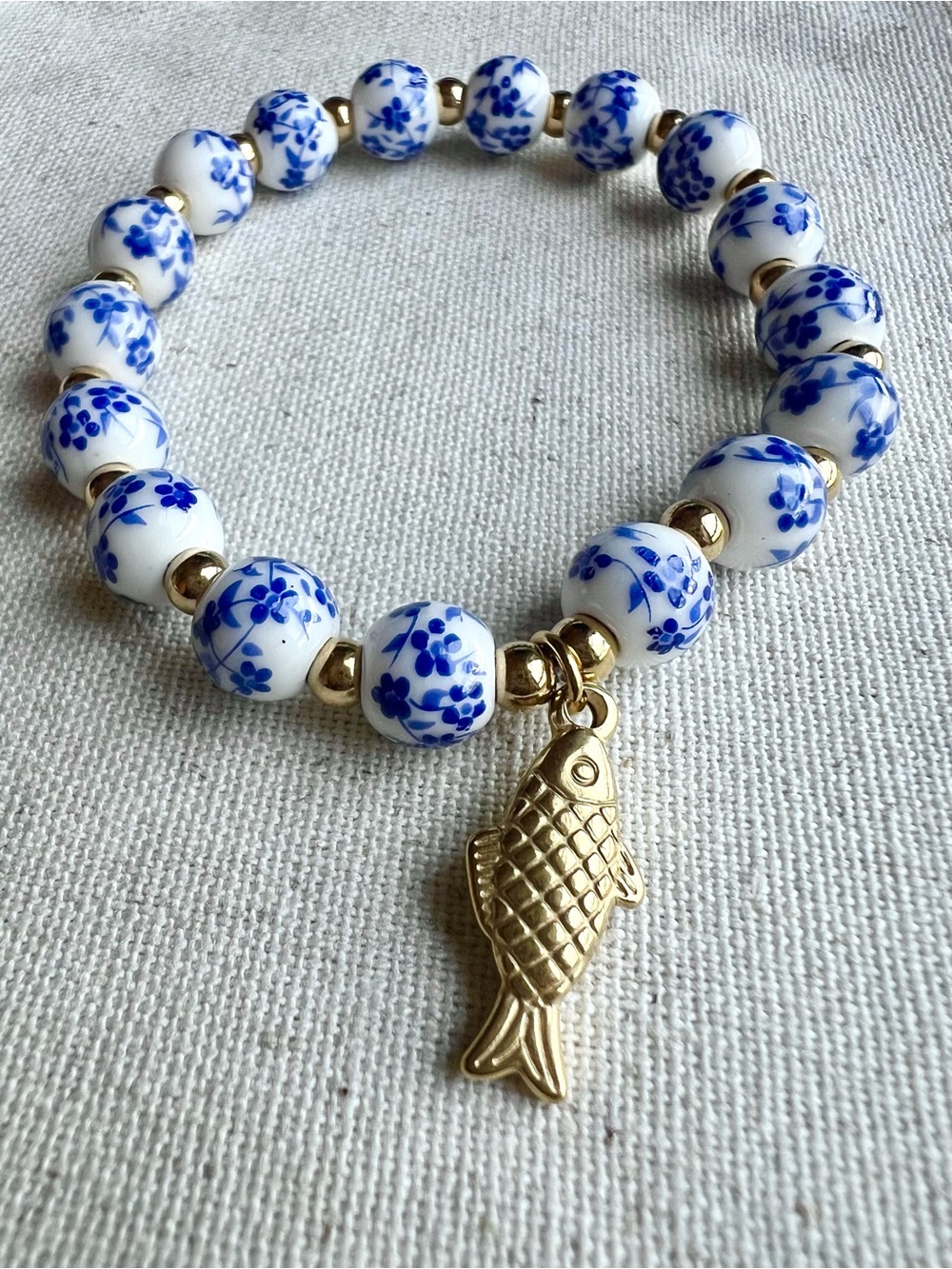 Blue & White Ceramic Bead Stretch Bracelet & 18k PVD Gold Plated Fish Charm NWT